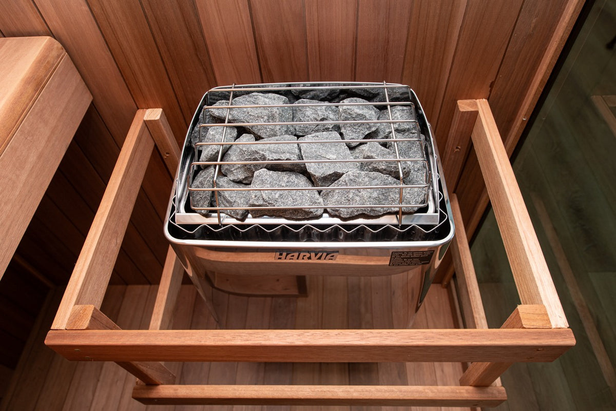 Element Nook electric heater with stones and wooden guard