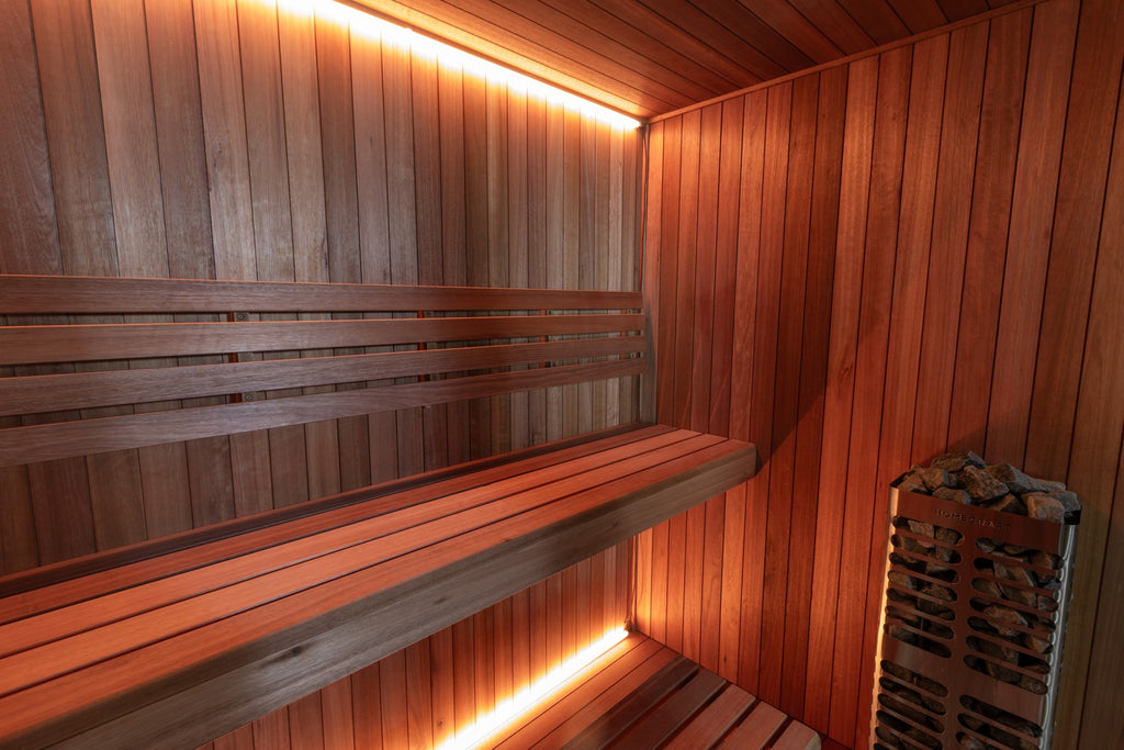 Element Studio interior showing benches, backrest and basket-style electric heater
