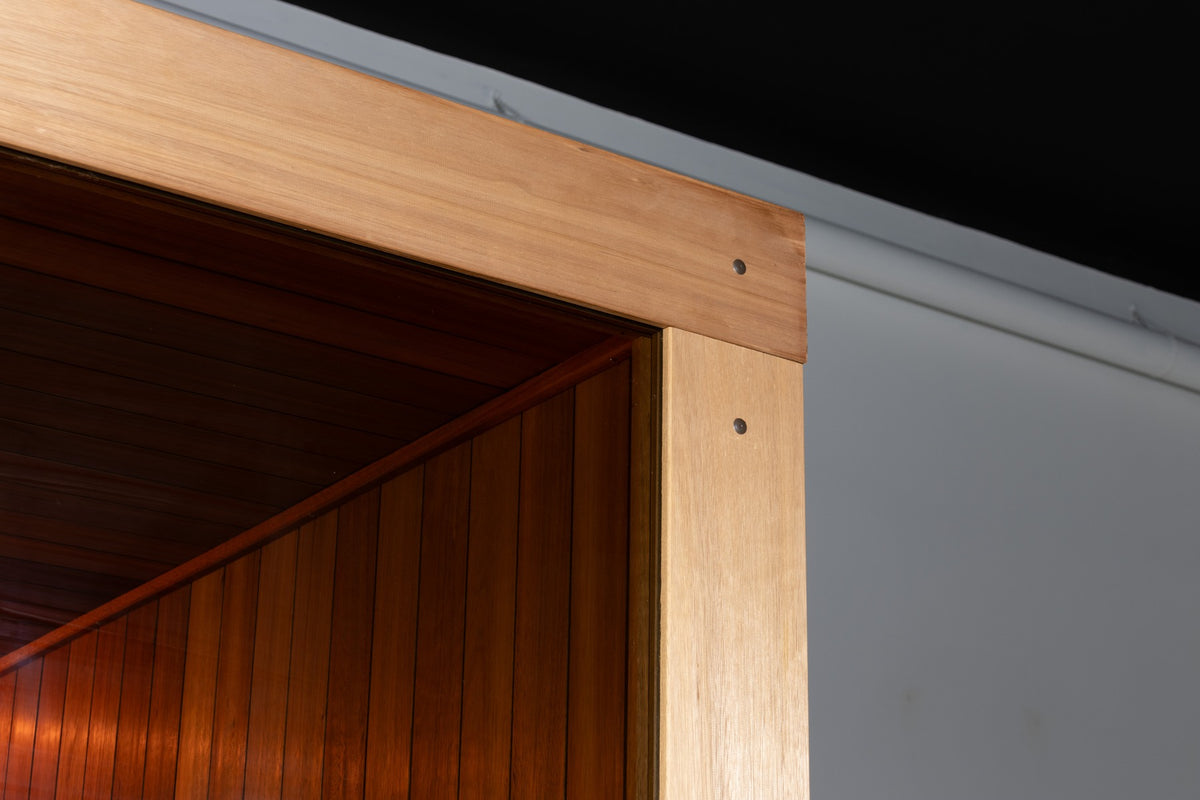 Element Studio upper wood frame and ceiling trim detail