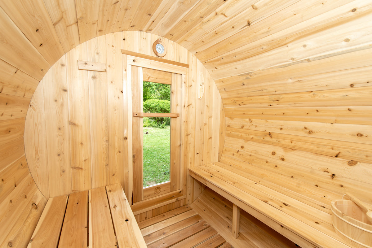 Harmony interior facing the glass-panel door and cedar benches