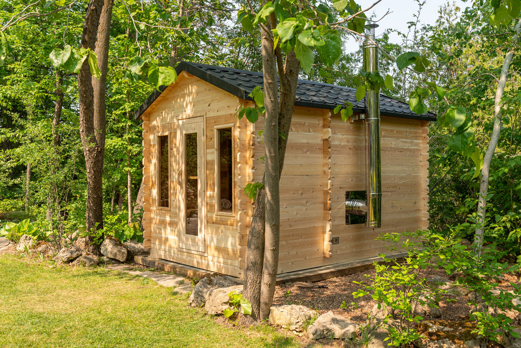 Leisurecraft CTC88C Georgian Cabin Sauna with Changeroom shown with optional wood-heater chimney